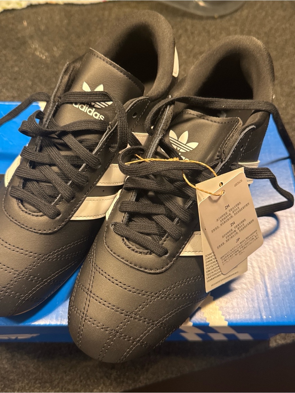 adidas Black Sneakers with White Stripes and Trefoil Logo
